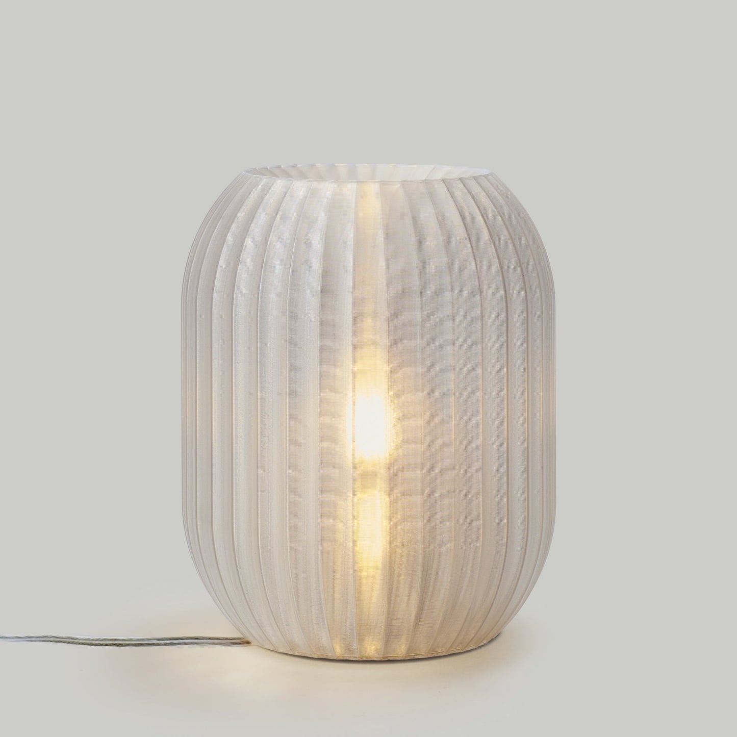 Lampe Allium – suspension et applique en forme d’oignon imprimée en 3D avec finition mate et transparente